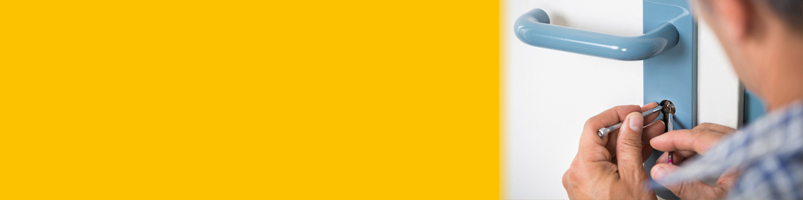 Residential locksmith installing a new lock on a house door in Fourways, Johannesburg